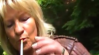 Gloria-Mature Bikerlady Smoking in full