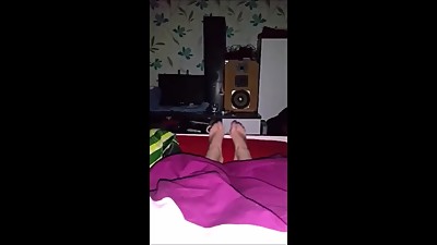 Larissa Celine lies in her Bed and