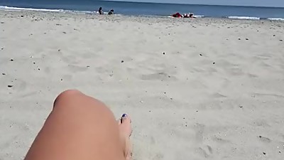 Milf fingering on public beach