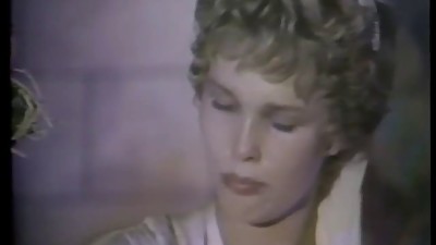 Dark haired slut sucks a blonde