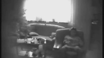 Mummy masturbating in living room.