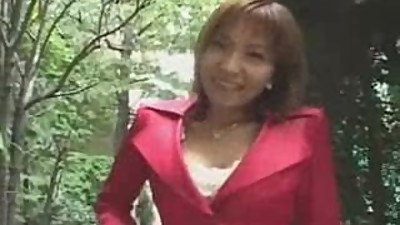 Japanese MILF uses a remote control