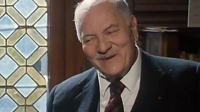 Suited Grandpa gets a blowjob