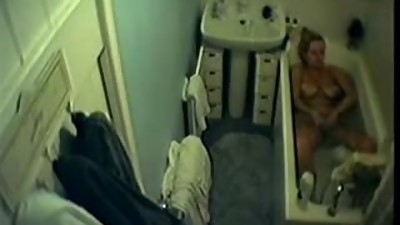 My mum rubbing pussy in bath tube.