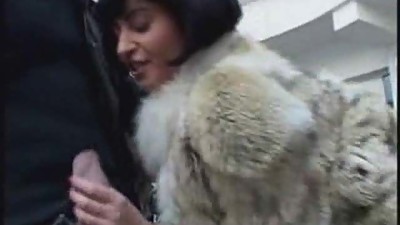 Mature in Fur Coat and Boots