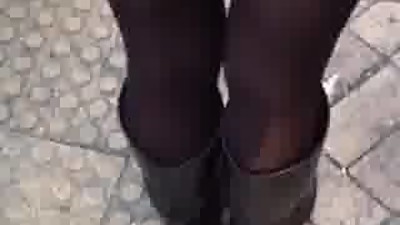 Asian woman waiting for crossing