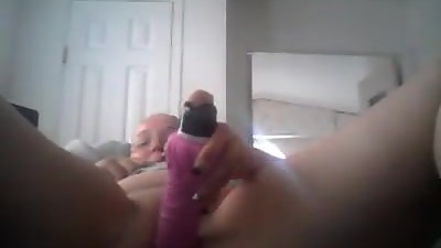 Chubby bitch fucking herself with a