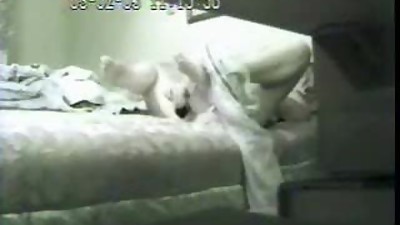 Mummy masturbating in bed. Hidden cam