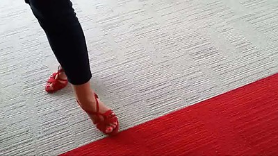 Friend's feet in red heels 1