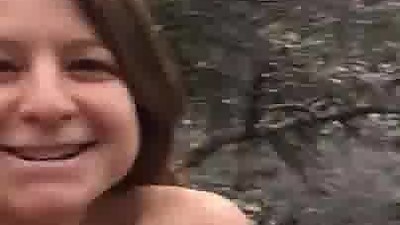 Naked milf with hairy pussy takes a piss