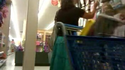 MILF upskirt in the art store.